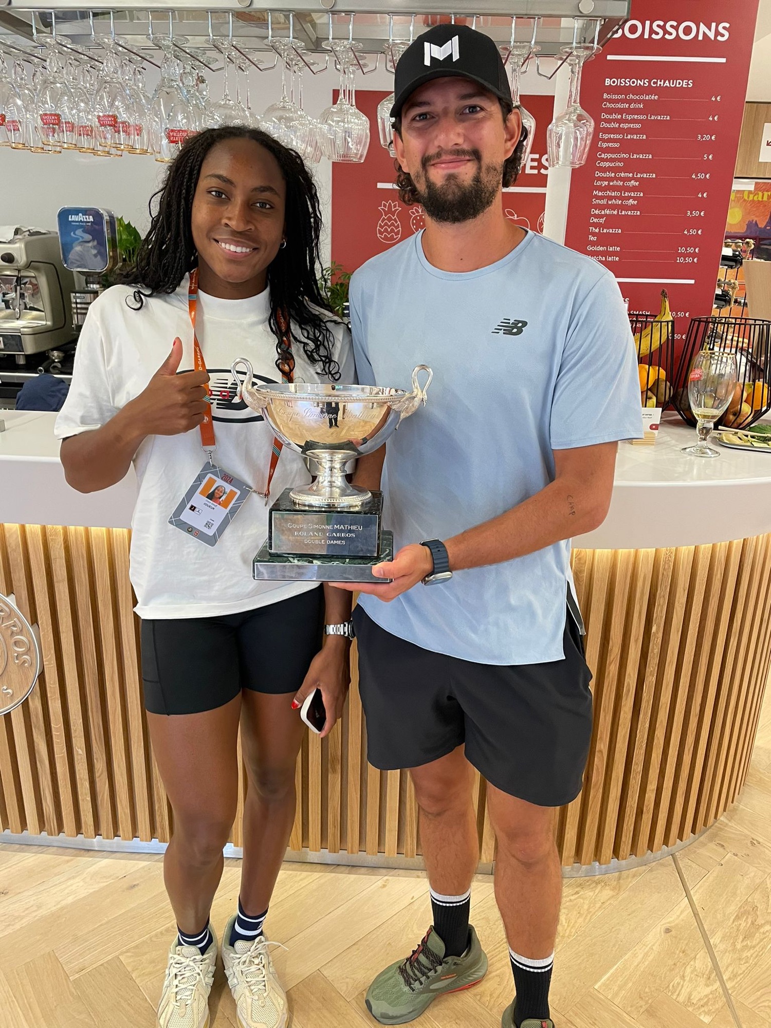 Coco Gauff and her team with the 2024 Roland Garros women's doubles trophy