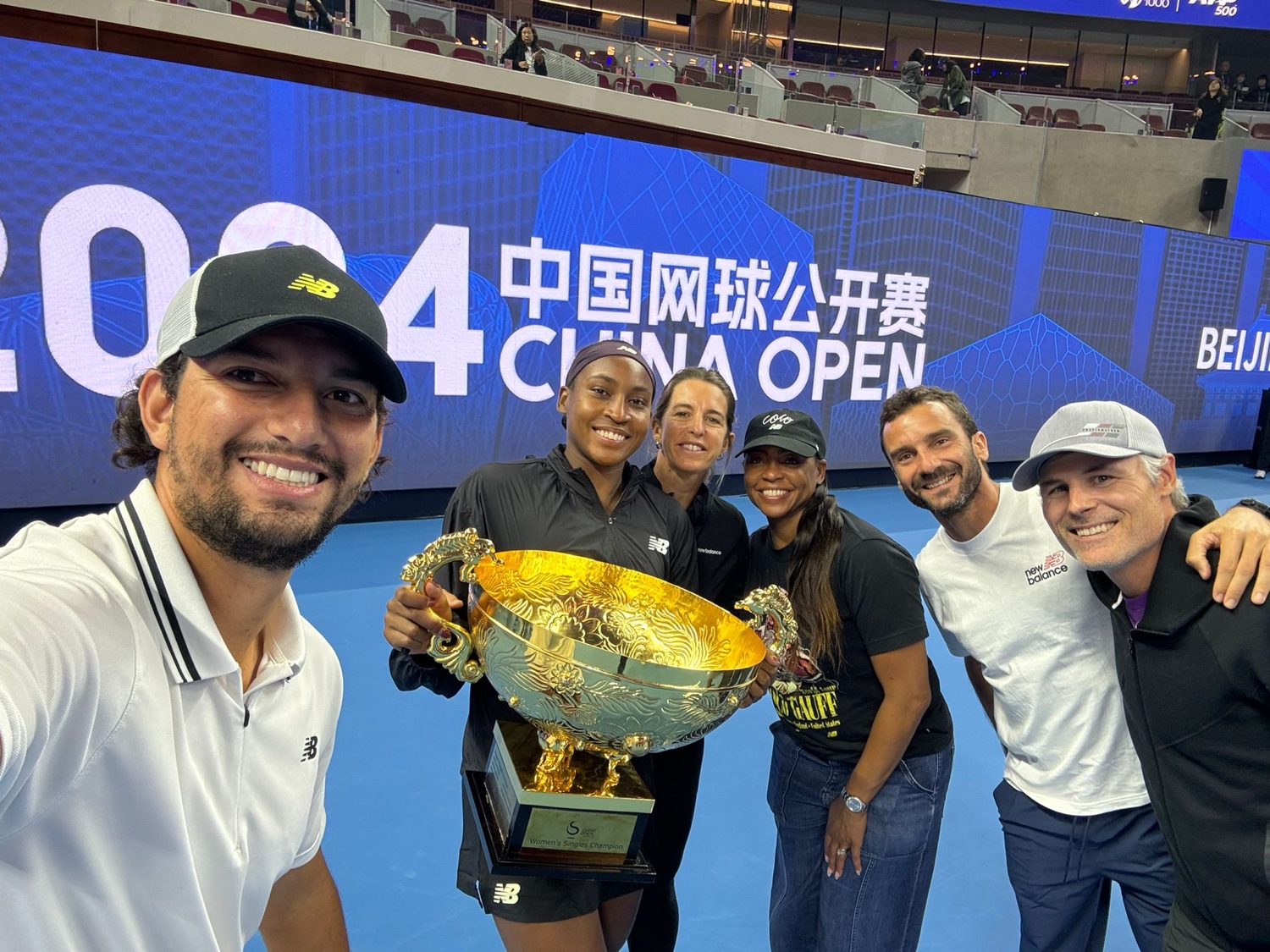 Coco Gauff's team celebrating the 2024 China Open title in Beijing